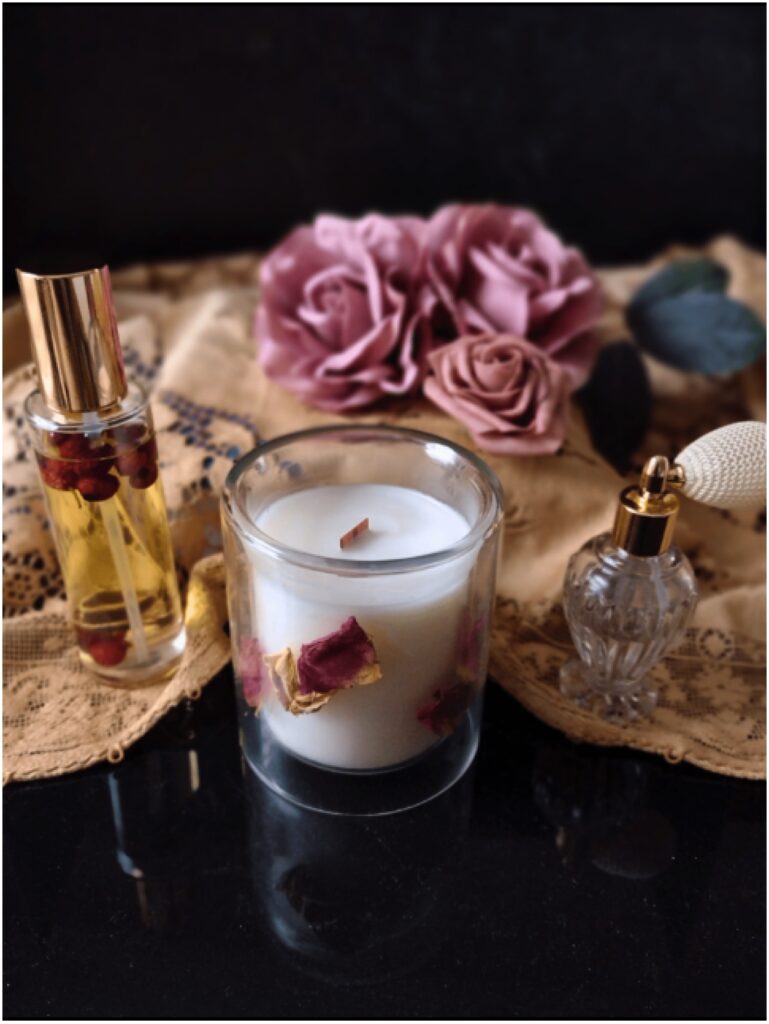 Artisanal product collections featuring rose candle, room spritz and body oil by Sun & Moon Garden Botanicals