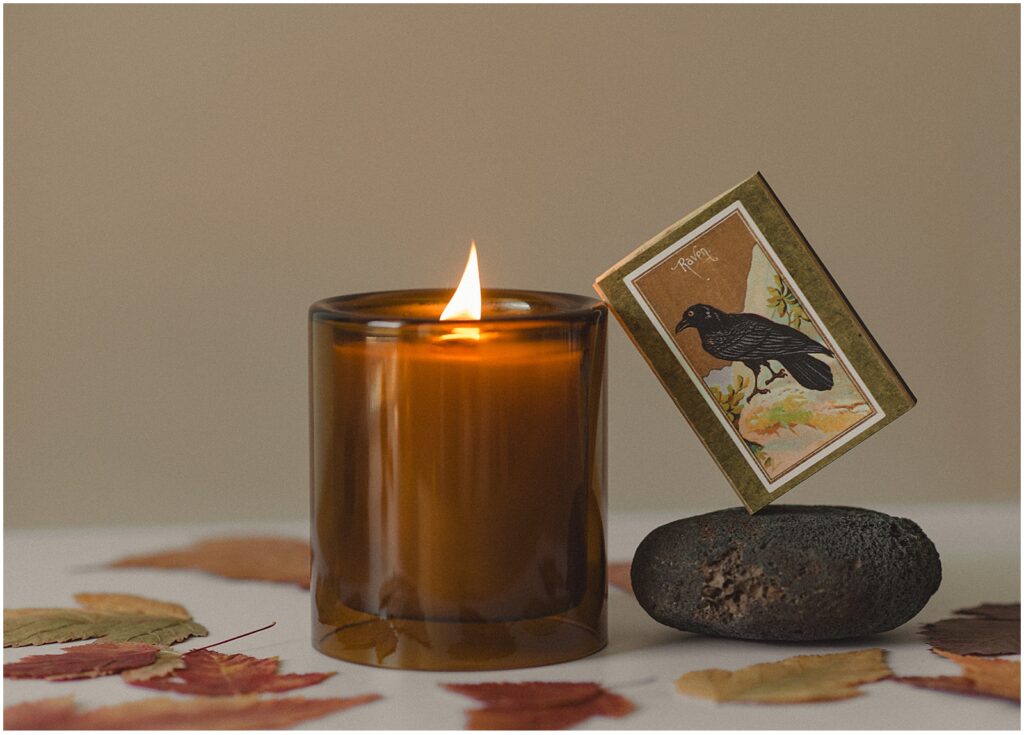 A pumpkin and persimmon fall candle by Sun & Moon Garden Botanicals